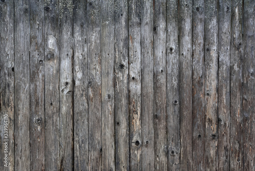 Old boards, a wooden peeled wall of brown color