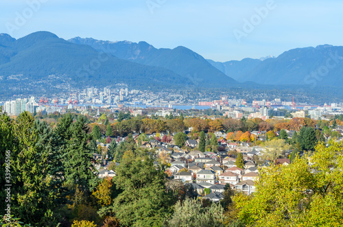 View on Vancouver Downtown and Mountains with Fall Colours. British Columbia. Canada. © karamysh