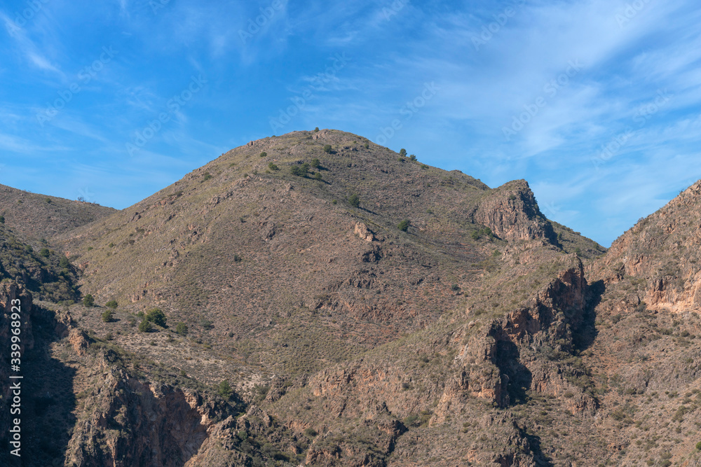 mountainous landscape near the Beninar reservoir (Spain) mountainous landscape near the Beninar reservoir (Spain)