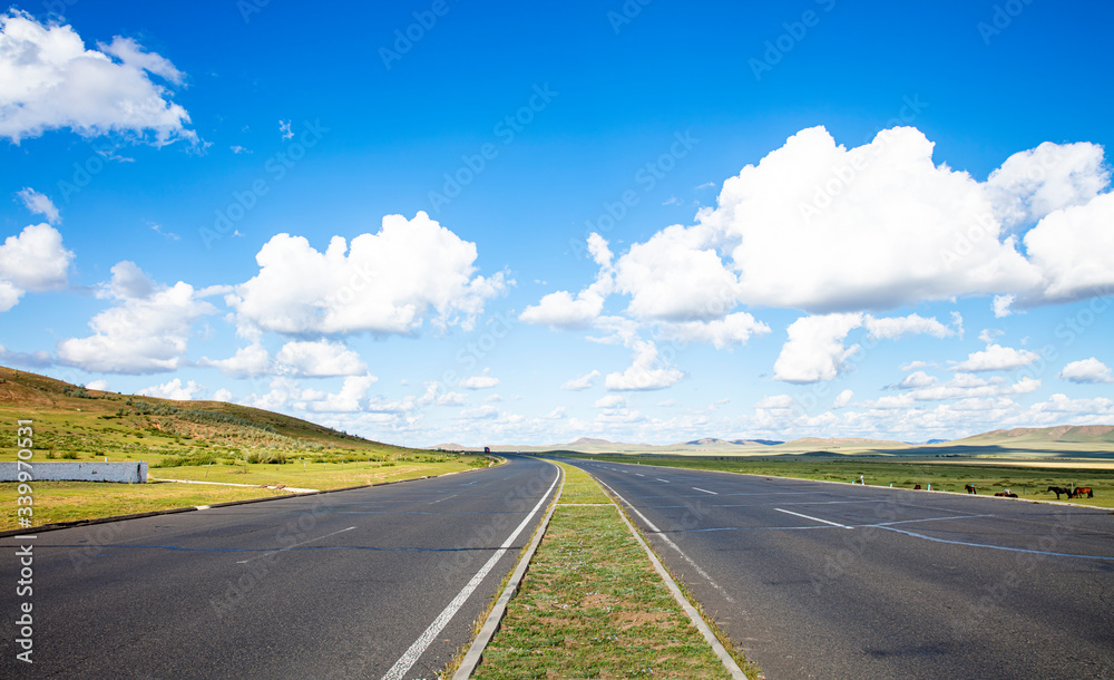 Empty highway, blue sky and white clouds landscape Empty highway, blue sky and white clouds landscape