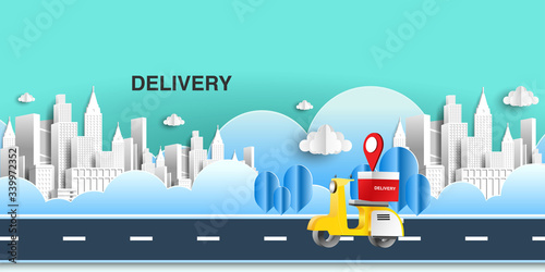 Paper art of delivery by yellow scooter on road with the city at back. Origami E-commerce and Online order infographic concept.