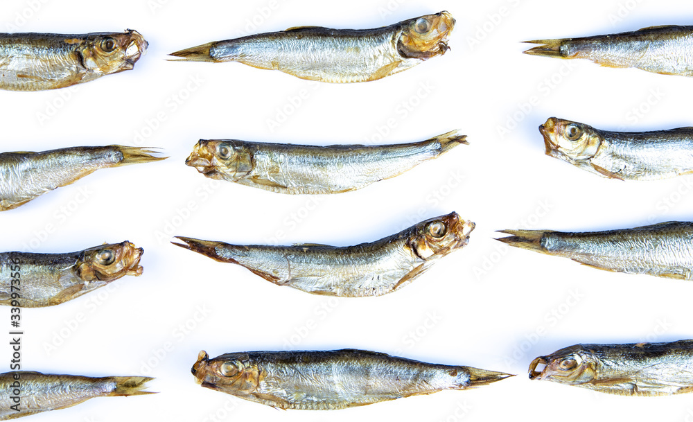 Smoked sprats on white background Smoked sprats on white background