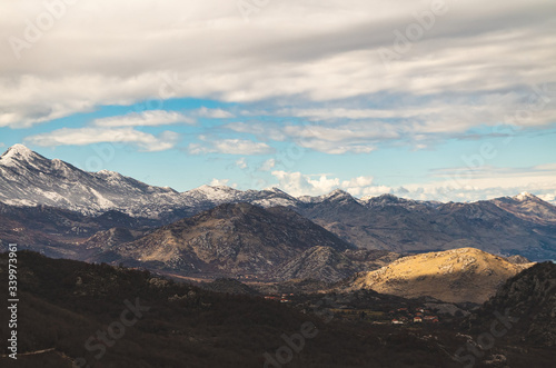 Mountain Landscape with Snow and Clouds