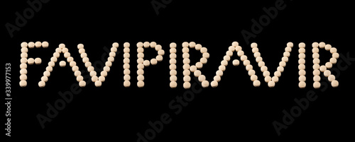 Favipiravir experimental drug for treating covid 19 written with pills photo