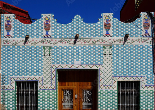 Tradicional Revival house in Cabanyal quarter with tiled facade. City of Valencia. Spain photo