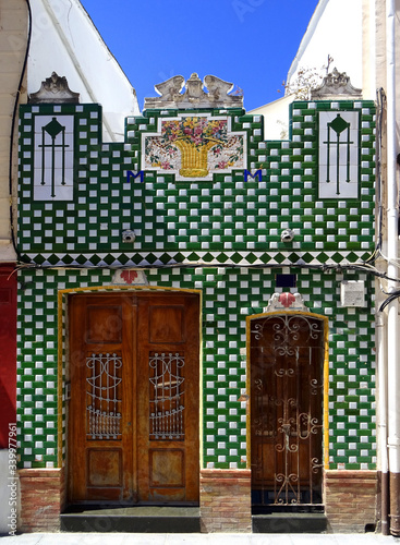 Tradicional Revival house in Cabanyal quarter with tiled facade. City of Valencia. Spain photo