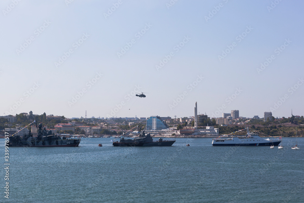 Ceremonial formation of warships on Navy Day in Sevastopol Bay, Crimea