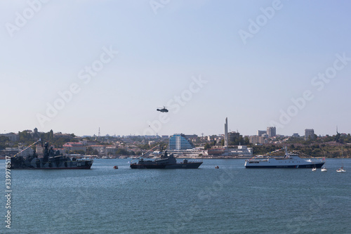 Ceremonial formation of warships on Navy Day in Sevastopol Bay, Crimea © muhor