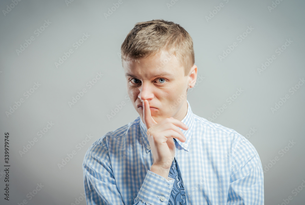 young casual man thinking young casual man thinking