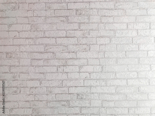 white brick wall with stones background with structure