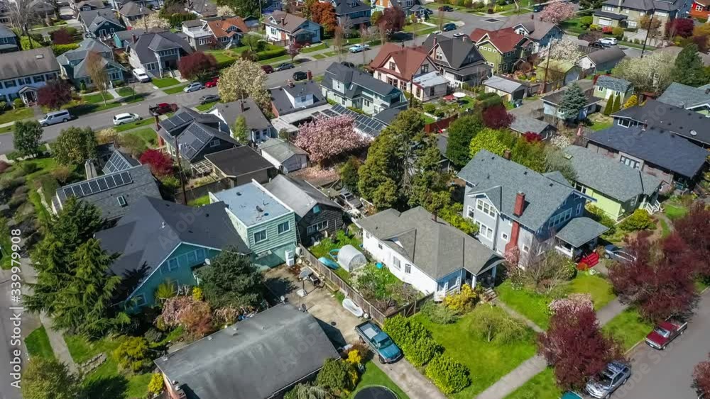 Aerial view of an American suburban neighborhood in the Pacific Northwest; drone point of view