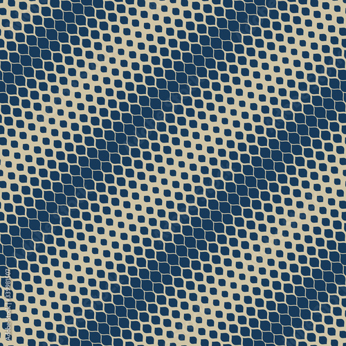 Vector halftone geometric seamless pattern. Elegant deep blue and gold texture with diagonal gradient transition effect, small ovate shapes, spots, petals. Abstract repeat background. Golden pattern