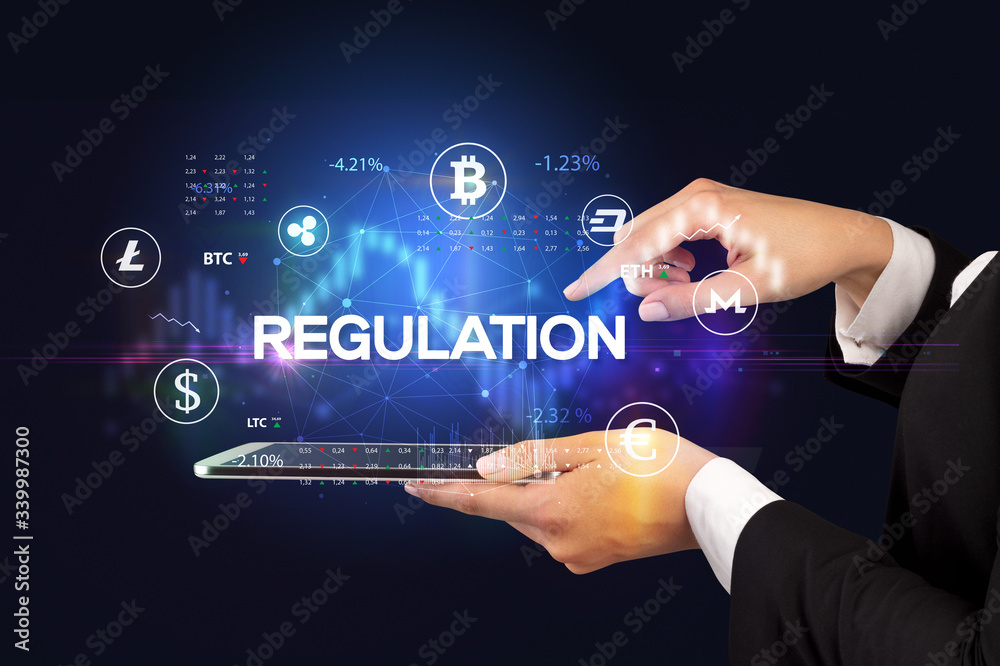 Close-up of a touchscreen with REGULATION inscription, business opportunity concept Close-up of a touchscreen with REGULATION inscription, business opportunity concept