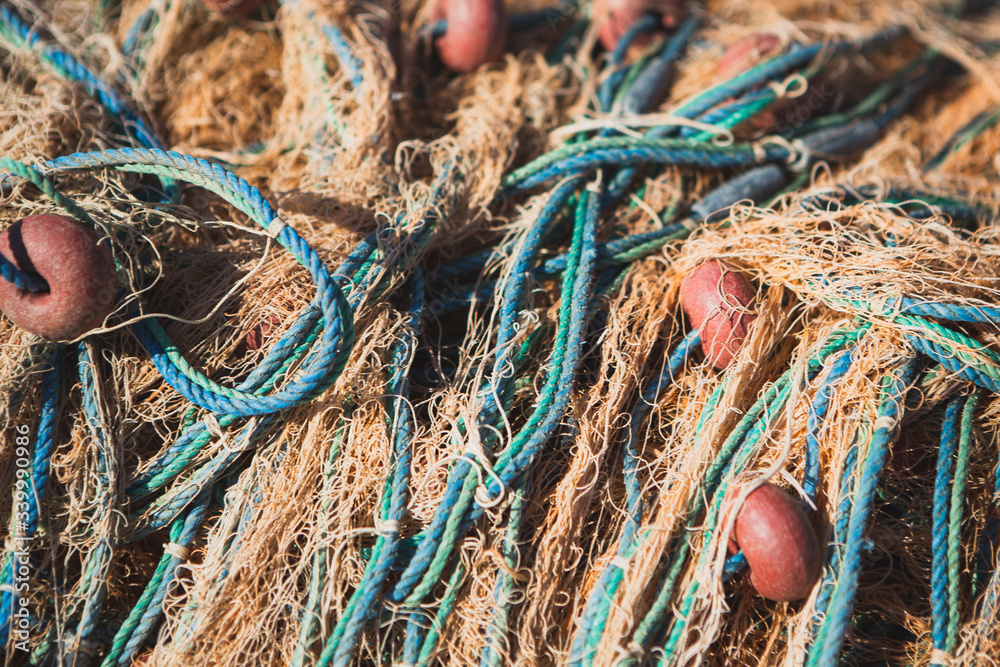 a bunch of old fishing nets tangled together, the perfect backdrop for fishermen a bunch of old fishing nets tangled together, the perfect backdrop for fishermen