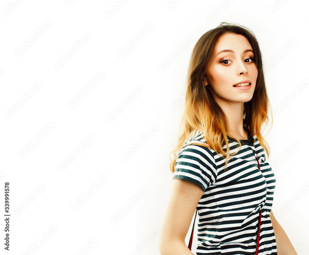young pretty teenage hipster girl posing emotional happy smiling on white background, lifestyle people concept young pretty teenage hipster girl posing emotional happy smiling on white background, lifestyle people concept