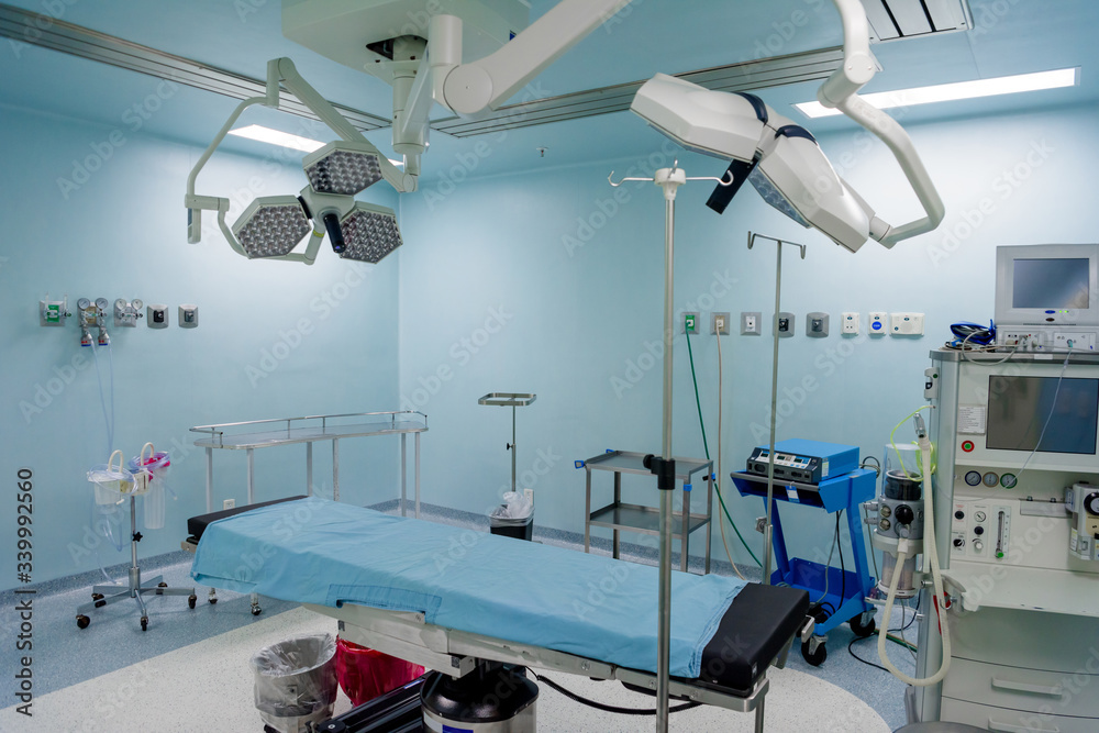 Fototapeta premium The operating room in the hospital with all the equipment in white and blue.