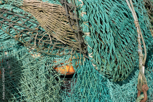 floats and old fishing net entangled and piled