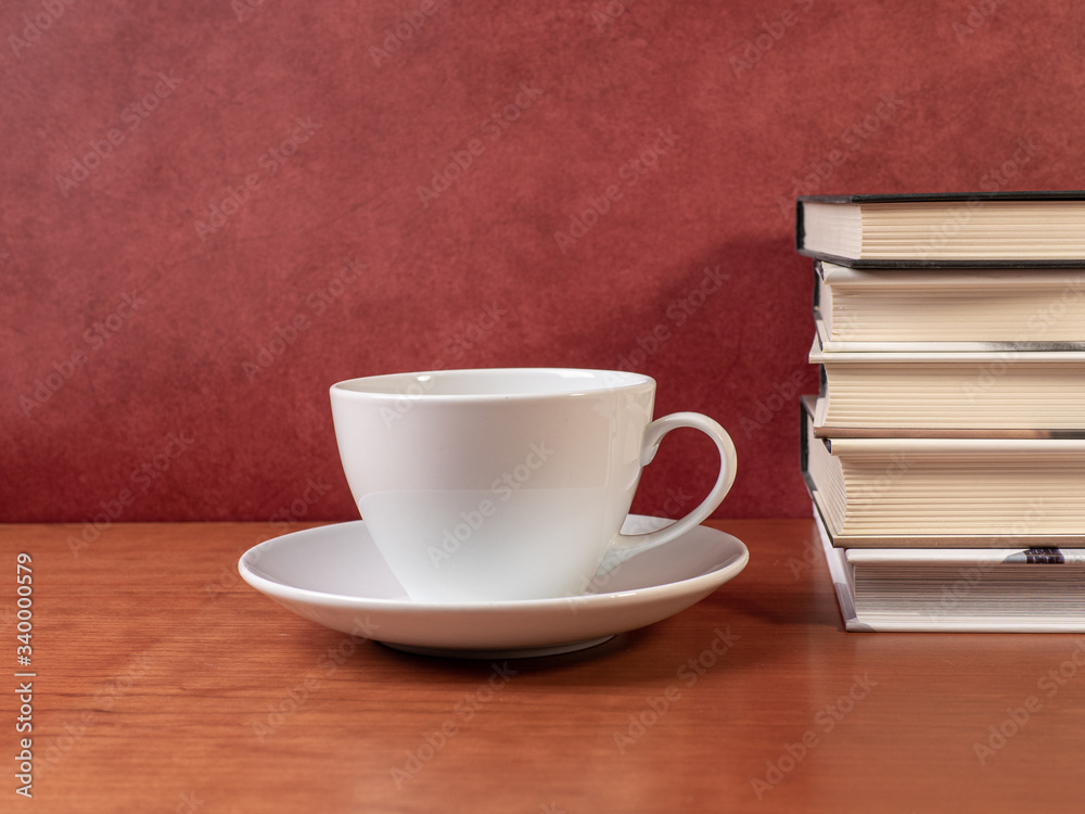 glasses and books on wooden table glasses and books on wooden table