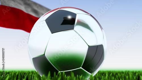 Seamless looping 3d animation of a soccer ball reflecting the flags of Wales and Czech Republic in 4K resolution