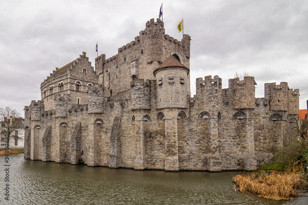 Gravensteen castle in Ghent by the canal