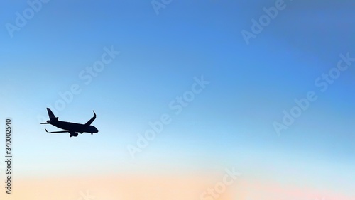 A large air plane flying in the sky