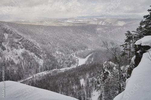 snow coniferous trees in the mountains of the Urals on top of mount aigir. photo