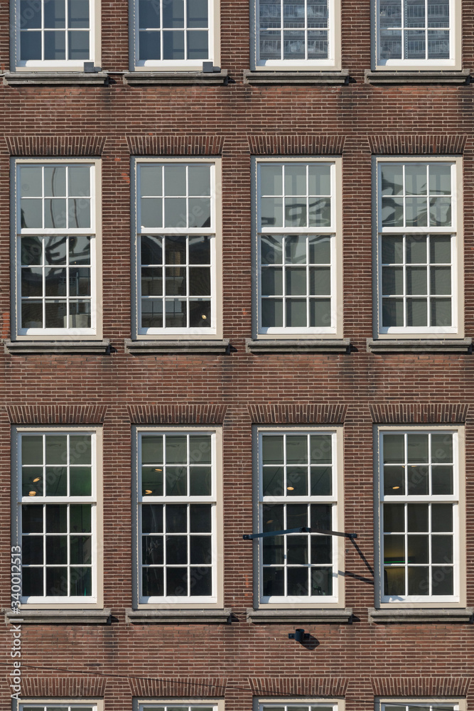 Fototapeta premium Classic Style House Windows in Amsterdam Netherlands