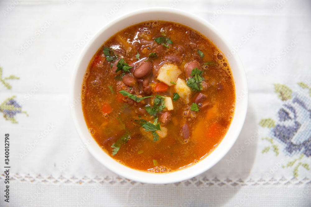 Traditional Azerbaijani Red bean soup . A bowl of homemade red bean soup . Red bean soup . Traditional Azerbaijani Red bean soup . A bowl of homemade red bean soup . Red bean soup .