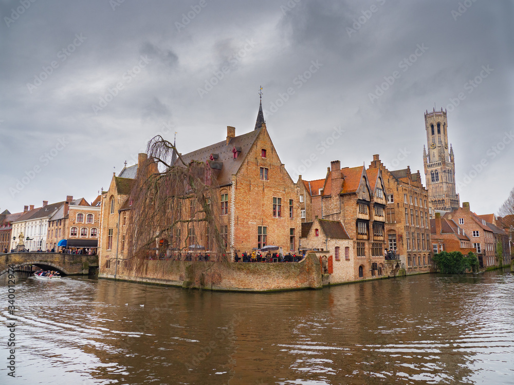 typical houses with a canal in Bruges
