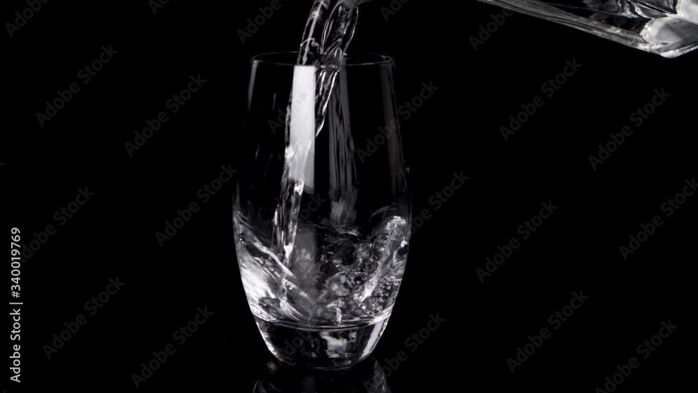 Fresh drinking sparkly water pouring in slow motion Fresh drinking sparkly water pouring in slow motion