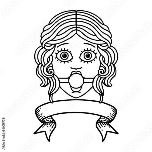black linework tattoo with banner of female face with ball gag