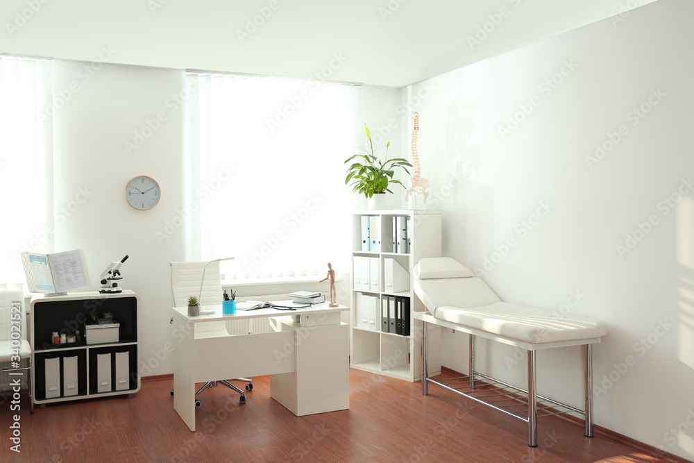 Fototapeta premium Interior of modern medical office. Doctor's workplace