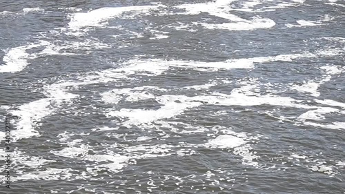 Big waves river in abstract style on blue background. Abstract art background.