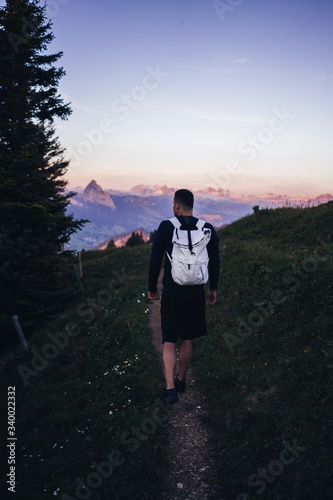 Man on a walk on the peaks of the Swiss mountains, Mount Rigi
