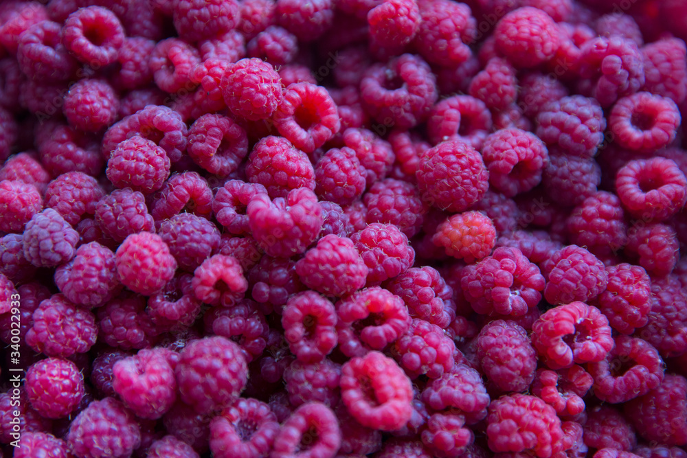 Raspberry berries in a bucket. Top view. Raspberry berries in a bucket. Top view.