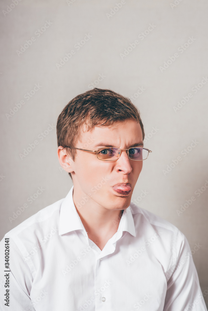 man shows tongue man shows tongue