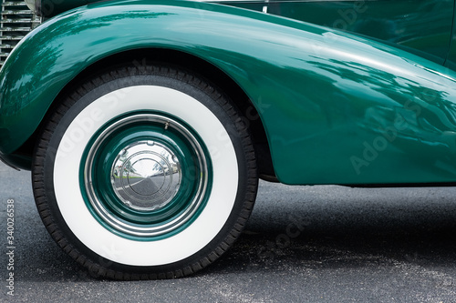 Front fender and whitewall tire on classic car © David Gales