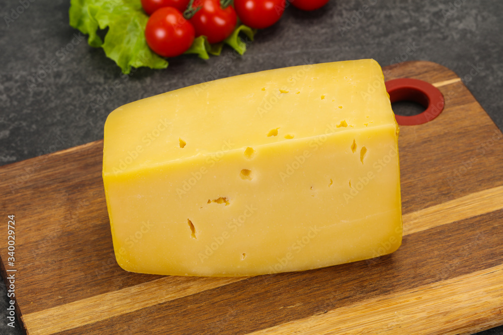 Hard yellow tasty cheese brick Hard yellow tasty cheese brick
