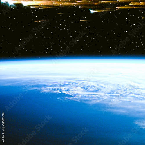 Earth and comet. The elements of this image furnished by NASA.