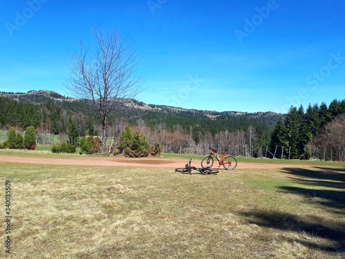 Mountain bikes on mountain and a landscape with blue sky