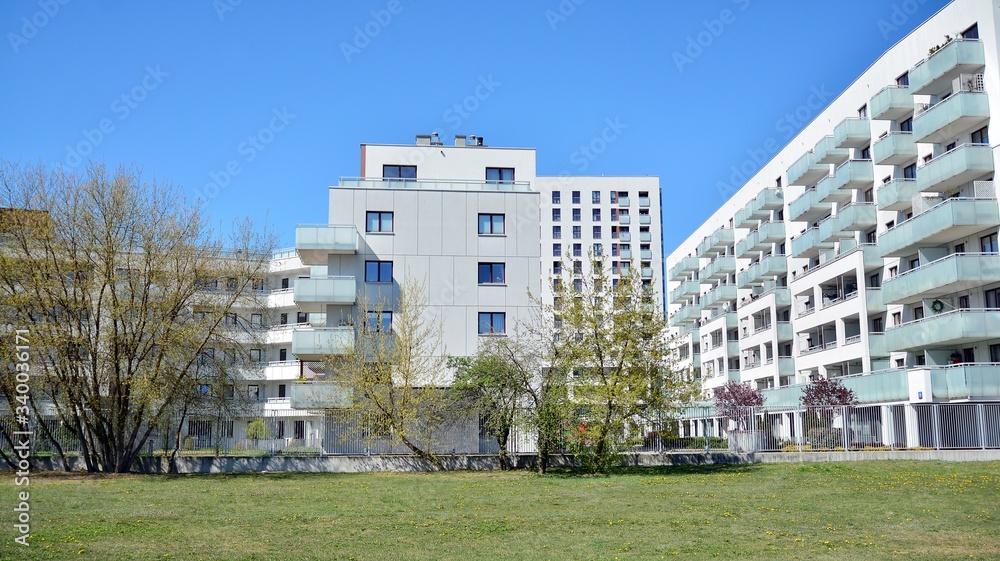 Modern apartment building in sunny day with a blue sky. Facade of a modern apartment.