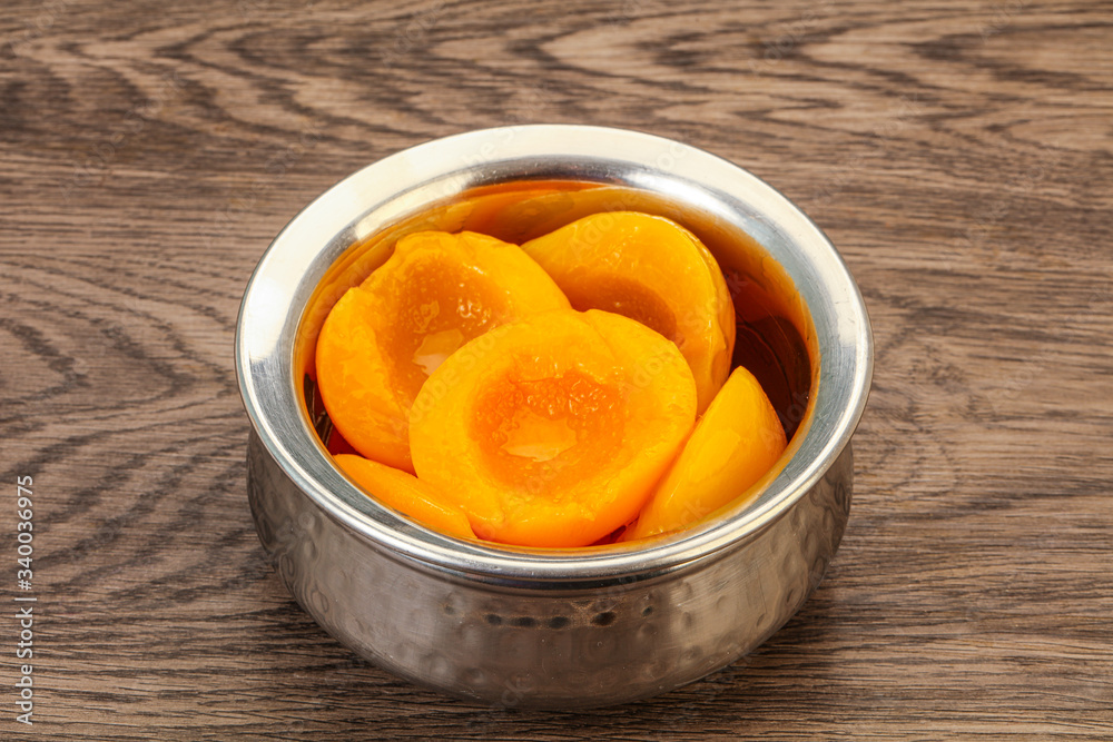 Marinated peaches fruit in the bowl Marinated peaches fruit in the bowl
