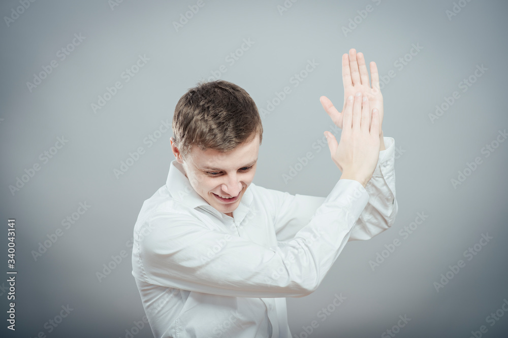 young man dancing and clapping her hands young man dancing and clapping her hands