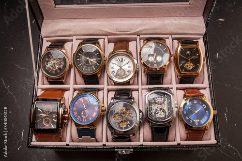 storage box with collection of men wrist watches