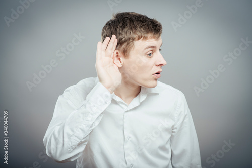 young man which overhears conversation