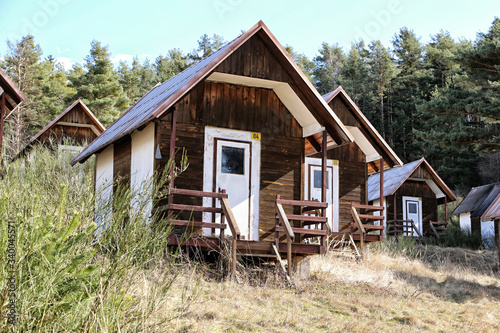 Small wooden cottages in tourist camp