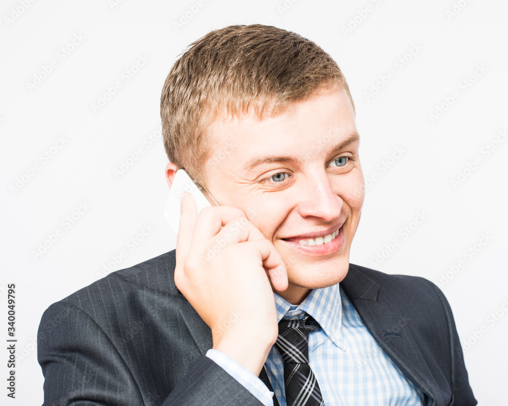 Portrait of cheerful man talking on the phone
