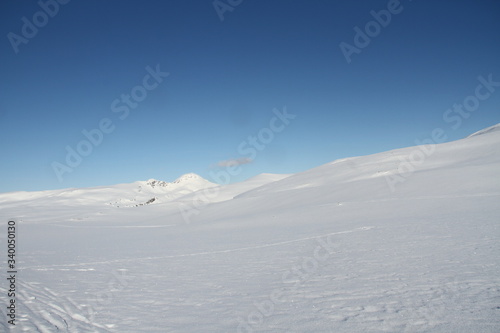 winter, snow, mountain, landscape, sky, ski, nature, cold, white, ice, blue, mountains, skiing, alps, glacier, cloud, sun, season, frost, sunlight, ridge, top, day, sport, outdoors sunset, sky, sun