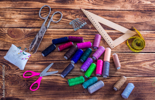 sewing accessories on wooden table