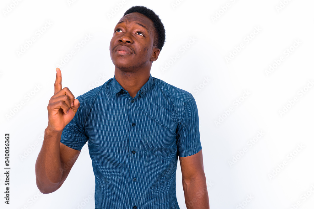 Young handsome African man against white background Young handsome African man against white background